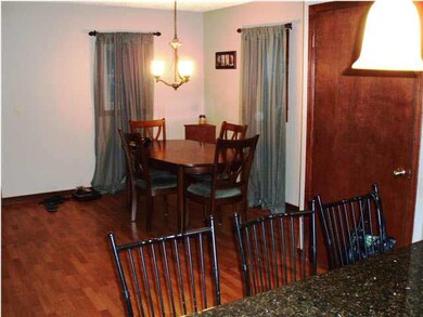 DINING ROOM FROM KITCHEN IN NEW OPEN FLOOR PLAN.