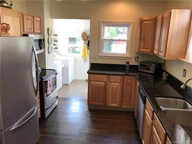 Kitchen with Adjoining Laundry Room