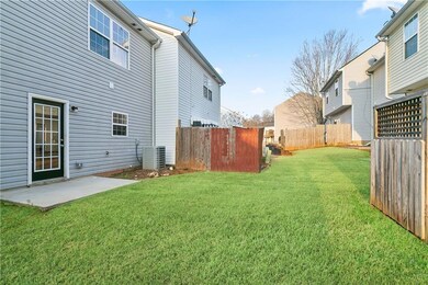 View of yard featuring cooling unit and a patio ar