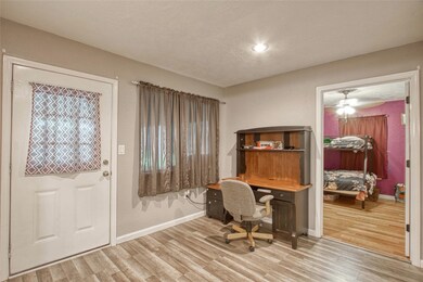 Breakfast area or use as a study. a view of bedroom #3 in the back.