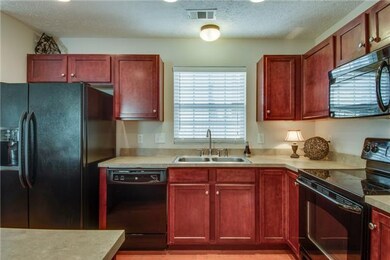 Pretty cabinets and functional work space.