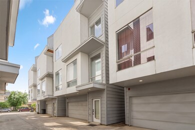 Modern multi-level townhome with a sleek exterior