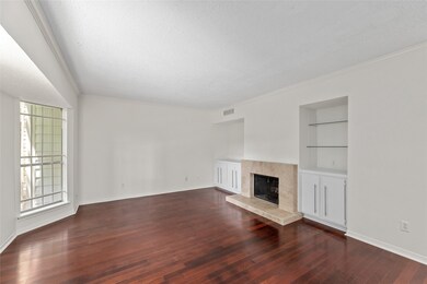 Living room has beautiful cherry wood floors