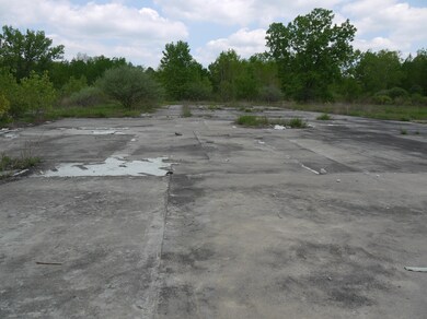 mostly paved and gravel surface