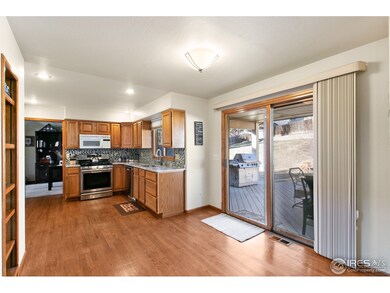 Kitchen flows out to covered deck