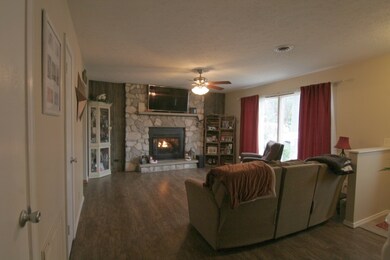 Living Room has wide plank flooring from Krempp Lu