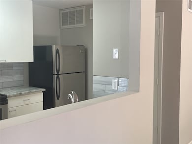 View of kitchen from living area