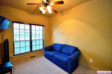 Located at off the entry is a guest bedroom with a