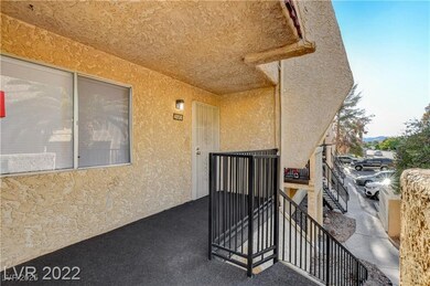 View of exterior entry with stucco siding