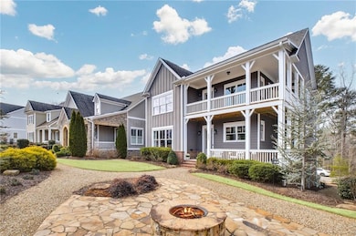 View of front of property featuring a balcony and 