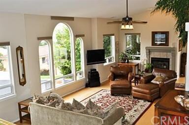 great room with soaring windows and lots of natura