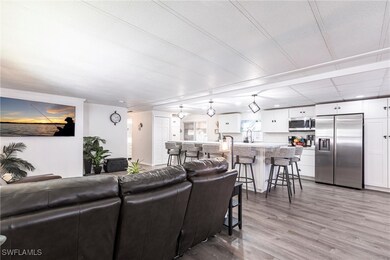 Living room featuring light hardwood / wood-style