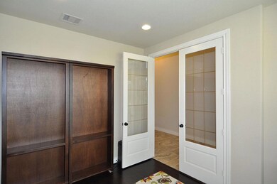Double doors provide privacy in the study.