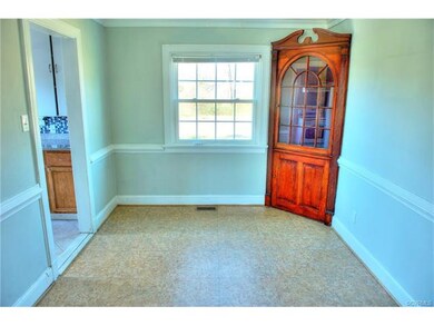 Dining room with built-in cabinet.