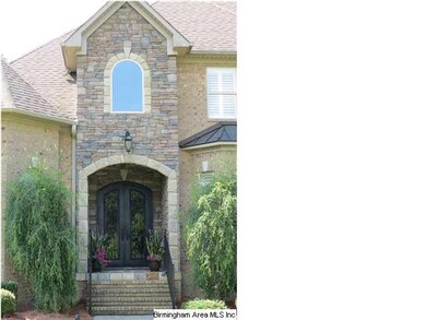 Lovely entrance with a castle door...
