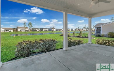 Covered back porch overlooking Forest Lakes