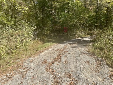 From the end of the road the property is the driveway to the left of the red sign.