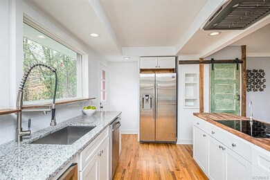 KITCHEN W/ 2 LARGE PICTURE WINDOWS, SS APPLIANCES,