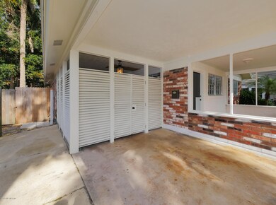 Shuttered Door in Carport