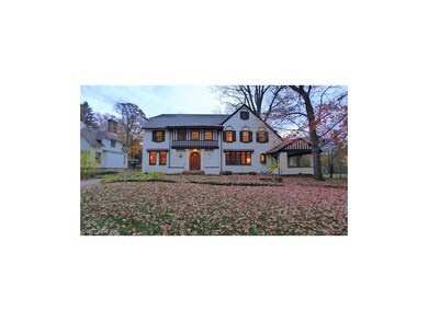 Impressive front view of this grand home with hand