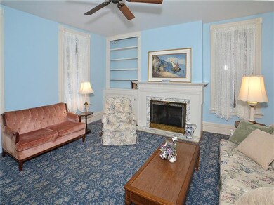 First floor living room with fireplace as a focal 