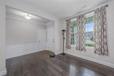 Elegant details abound, as well as large windows f
