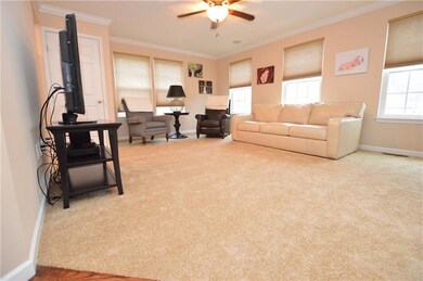 Great size livingroom with a closet and lots of wi