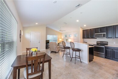 Dining, Kitchen looking to front entrance & living