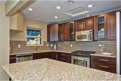 New Kitchen With Custom Dark Cabinets, Granite Cou