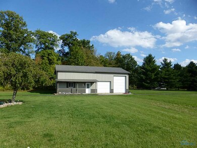 Out Building. 30x50 pole barn w concrete floor.