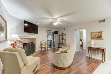 Beautiful family room, tv can stay.  Laminate wood