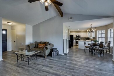 Open floor plan, notice the wood beam in ceiling.