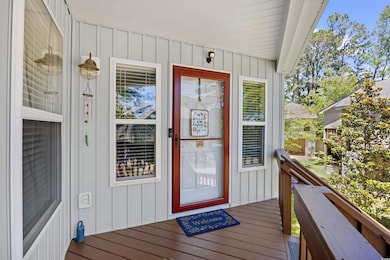 Entrance to property with board and batten siding
