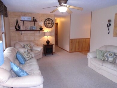 A clean view of the Living Room from the front doo