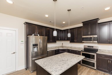 KITCHEN W/ GRANITE, SS APPLIANCES, PENDANT LIGHTS,
