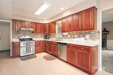 The kitchen offers stainless steel appliances, inc
