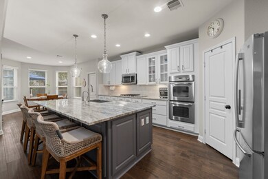 This spacious updated chef-style kitchen features
