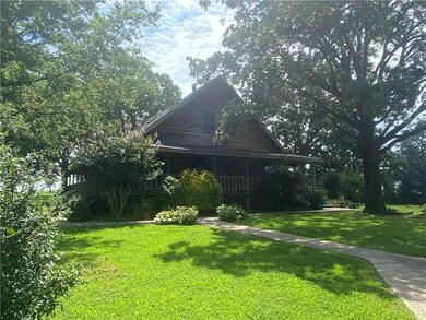 West side of the home; beautiful setting.