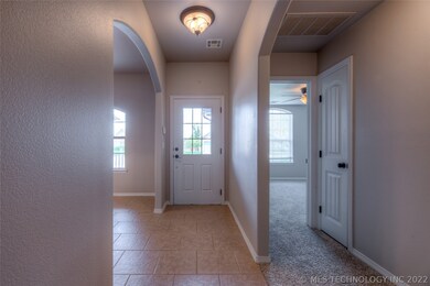 Front entry. Formal dining to the left. First bedr