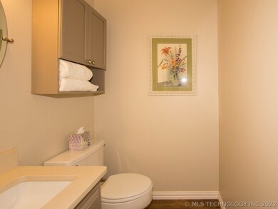 Spacious half bath on main level for guests.