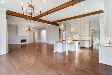 breakfast room, kitchen, great room, wood floors,