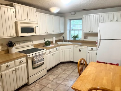 Kitchen with tile flooring