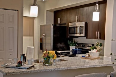 8105 Tumblestone Ct unit 717, Delray Beach, FL 33446 - photo 2