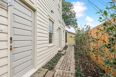 Side entrance...landscaped and private...