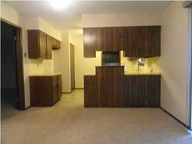 DINING ROOM LOOKING INTO KITCHEN