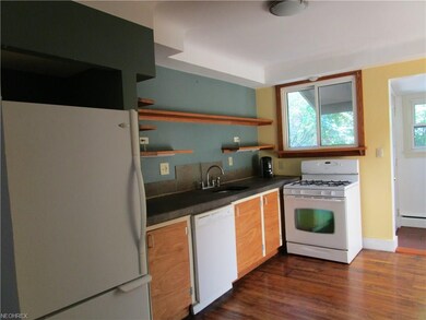 Open shelving concept in the kitchen with a cement