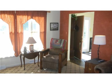 Living Room. Entrance into the home leads in to th