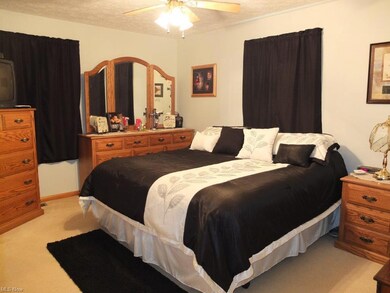 1st floor master suite with private full bath.