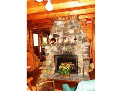 Other. Fieldstone fireplace in the...