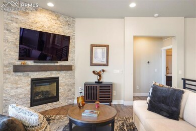 Focal point with Stacked stone Gas fireplace.